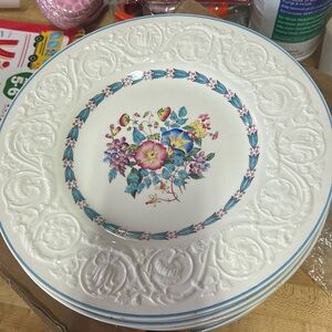 Preowned Wedgewood Morning Glory 9” Dinner Plate with small chip. See last photo